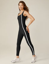 black square neck tank top midi jumpsuit with white lining on the sides.